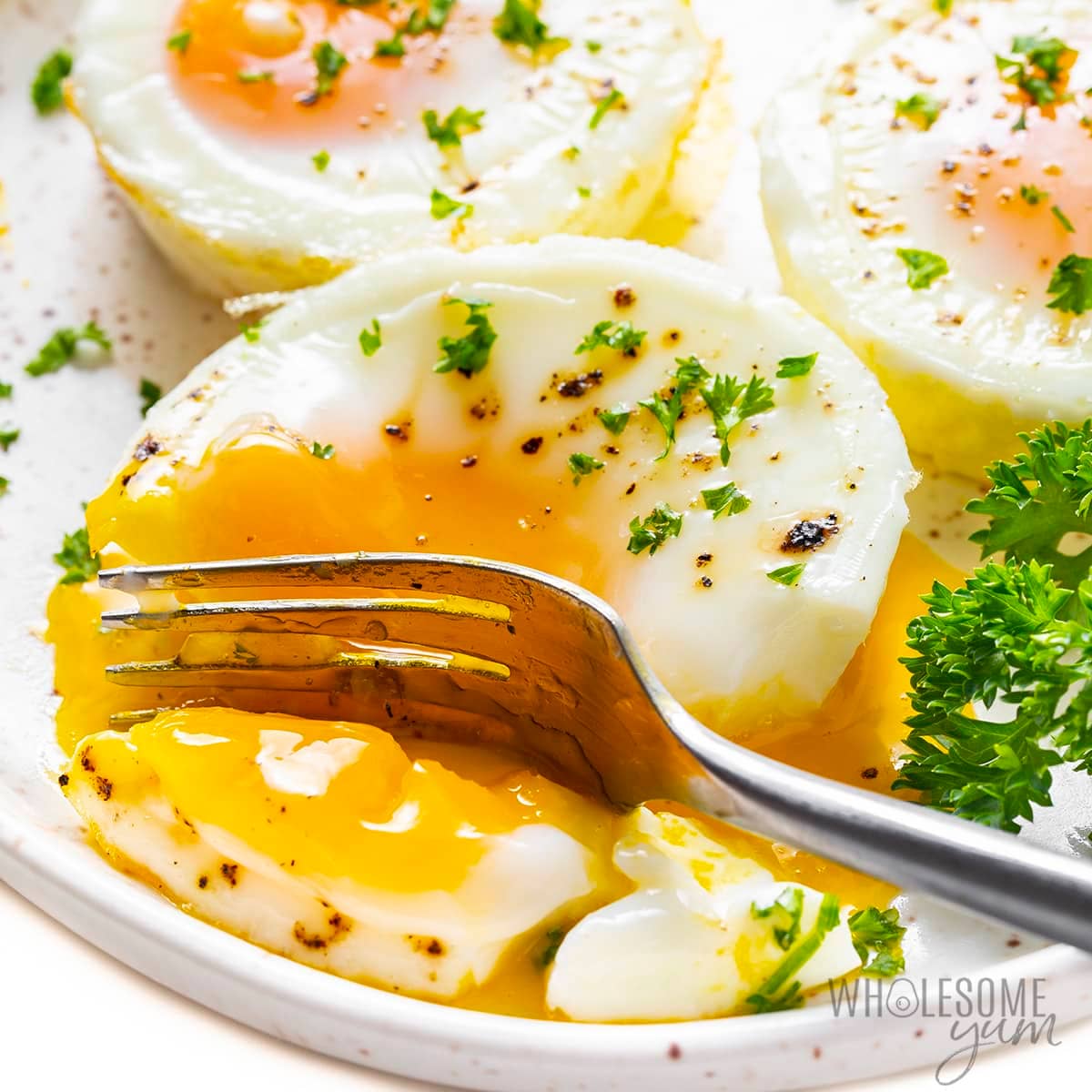 Oven baked eggs with runny yolk.