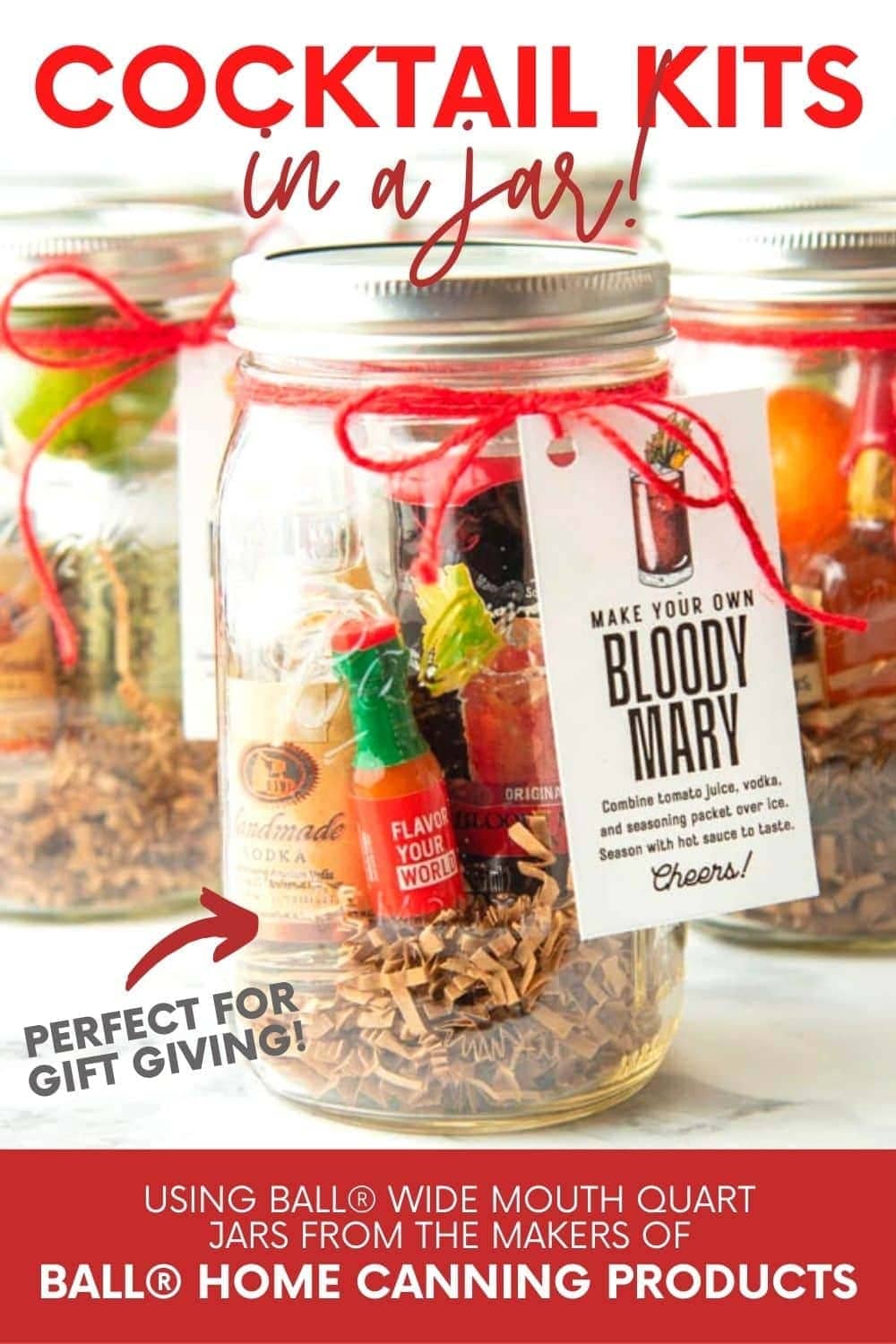 Close view of a diy bloody mary cocktail kit. A text overlay reads, "Cocktail Kits in a Jar! Perfect for Gift Giving! Using Ball Wide Mouth Quart Jars from the Makers of Ball Home Canning Products."