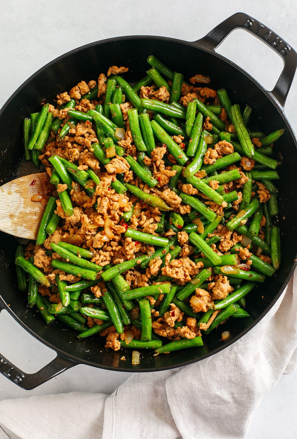 Quick and flavorful Ground Turkey and Green Bean Stir Fry easily made in under 20 minutes all in one pan!  Lean ground turkey with crisp green beans all tossed together in the most delicious Asian-inspired sauce that